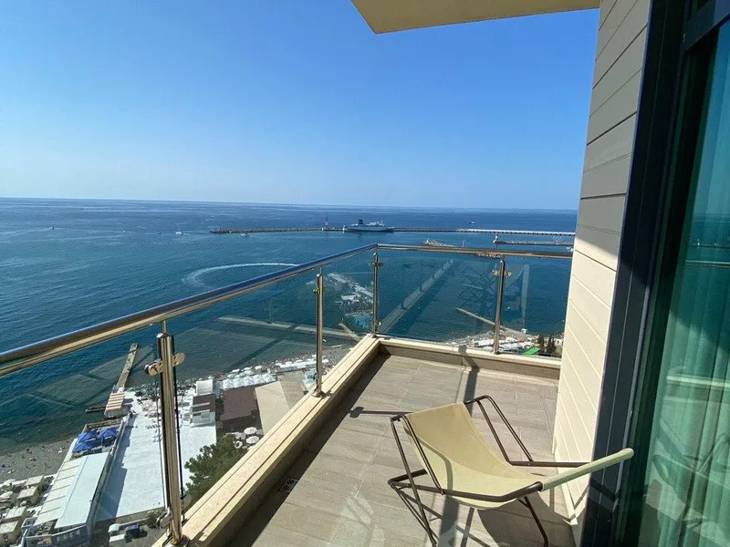 Люкс с видом на море в Отель PULLMAN Сочи